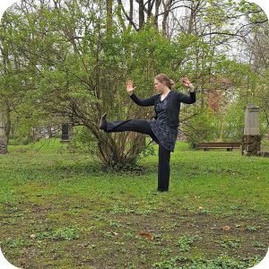 what is Tai Chi Chuan or Taijiquan: blogger Angelika (Qialance) showing a kick